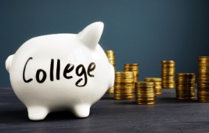 Picture of piggy bank labeled College with coins in the background