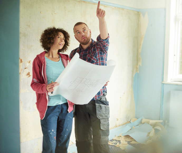 Couple reviewing plans for remodel