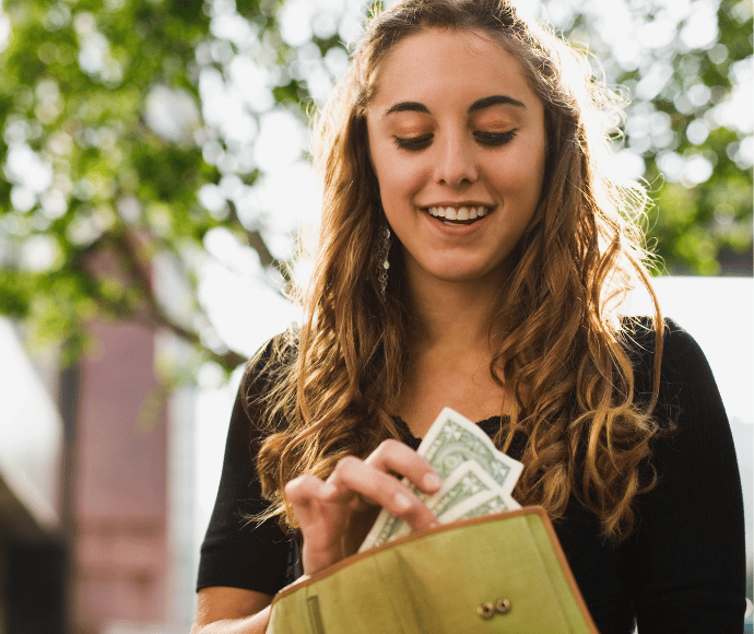 Student counting cash