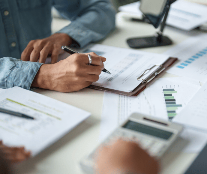 Business person checking things on a clipboard